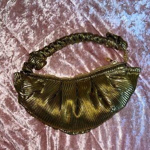 Gold shiny wrist purse